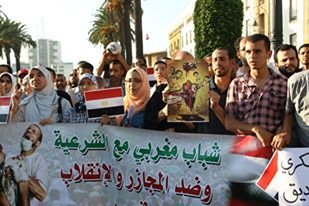 تنديد وشجب واستنكار قوي بمجزرة رابعة العدوية في وقفة حاشدة بالرباط